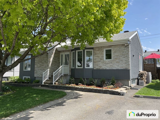 $720,000 - Bungalow for sale in Ste-Rose — photo 1