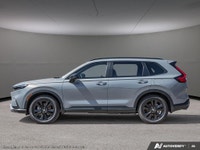 Step into the future with the 2026 Honda CR-V Hybrid Touring in a stunning gray finish and all-wheel... (image 2)