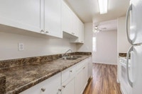 Amenities: In-suite Laundry • Playground • Private Yard Suite & Building: Two-bedroom and three-bedr... (image 3)