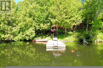 Looking for a Fabulous Riverfront Home or Cottage? This super spacious bungalow is nestled on a beau...