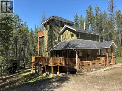 Rosen Lake Gem! This beautiful 4 bedroom, 2 bathroom home is tucked away on 2.5 acres. Sip your morn...