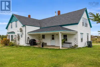 Perched proudly on an elevated hilltop, this classic farmhouse captures panoramic views over tidal c...