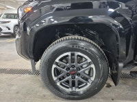 The 2024 Toyota Tacoma TRD Sport is built for adventure, combining off-road capability, bold styling... (image 9)