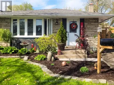 Welcome to 35 Cypress Street - a bright and inviting 4-level backsplit set on a deep 164 ft lot in t...