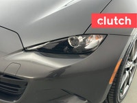 Auto Dimming Rearview Mirror, Front Heated Seats, Premium Sound System and more! Clutch is the large... (image 7)