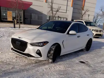 This G70 3.3 T Sport has one owner, non-smoker. * This car is fully loaded and then some. Exoshield...