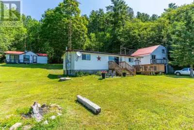HOME OR COTTAGE WITH GUEST CABIN! Discover this highly versatile 1.5 acre property, perfectly situat...