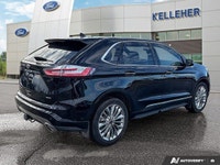 Experience effortless journeys in this sleek Black 2021 Ford Edge Titanium AWD. With just 40,149 kil... (image 4)
