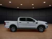 Experience the power of a 2019 Ford Ranger XLT in a crisp white finish, equipped with a robust 4x4 d... (image 4)