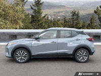 Navigating urban streets and weekend adventures is a breeze with this stylish Gray 2024 Nissan Kicks... (image 1)