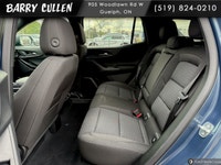 The vibrant blue 2026 Chevrolet Equinox FWD LT offers a fantastic front-wheel drive handling experie... (image 5)