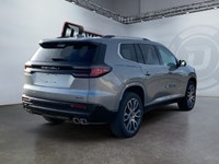 The spacious cabin offers premium refinement with perforated leather-appointed first-and second-row... (image 4)