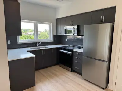 Sunrise Grove Stacked Condos Description Welcome to Sunrise Grove – Bright, Modern Living in the Hea...
