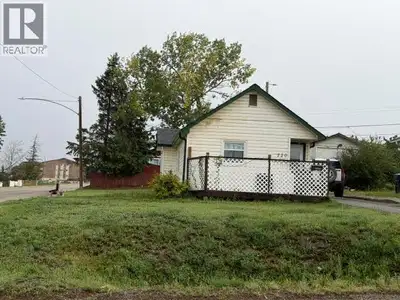 COZY 1 bdrm home BUILT in 1950-with timeless charm that feels so NIFTY! A tiny but well designed kit...