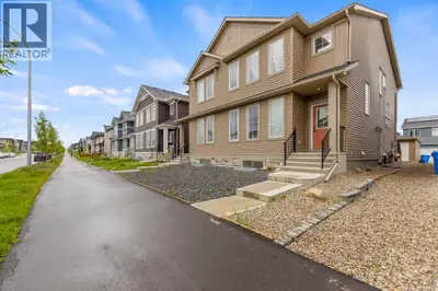 Welcome to this beautifully designed duplex in the sought-after community of Ambleton, offering mode...