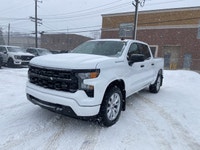 **WE WILL BEAT ANY DEALER IN THE CITY** Summit White 2024 Chevrolet Silverado 1500 Custom 4WD 8-Spee... (image 1)
