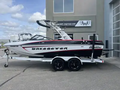 PRE-OWNED 2014 Malibu Wakesetter 21 VLX. Featuring Upgraded Indmar 6.0L 410HP with 414 Hours. Tandem...