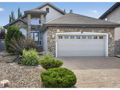 Executive bungalow with fresh paint & updated landscaping, offering over 3,400 sq.ft of meticulously...