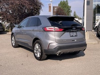 Our 2023 Ford Edge Titanium in Iconic Silver Metallic is in stock and ready for your driveway! Call... (image 6)