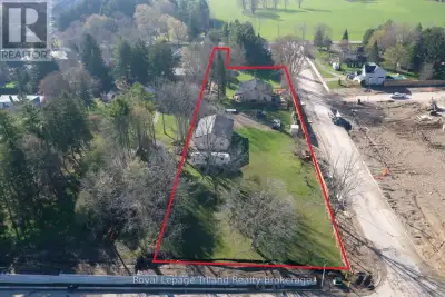 Prime development opportunity on the western edge of Woodstock. This 1.7-acre property offers strong...
