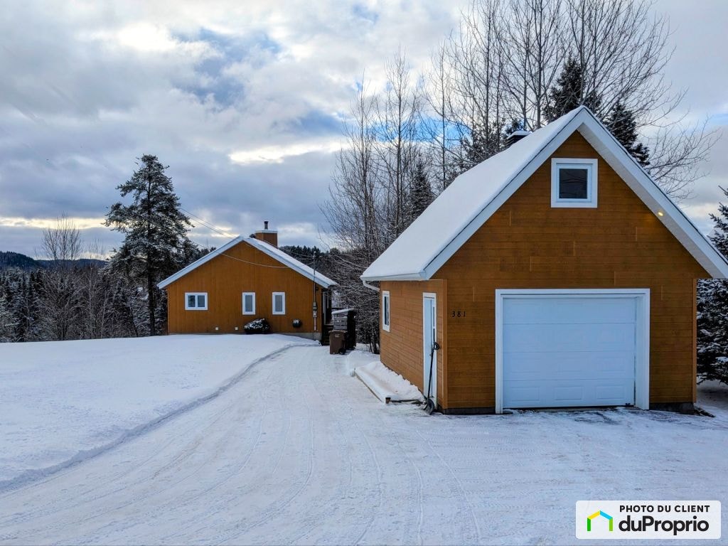 $550,000 - Bungalow for sale in St-Côme — photo 1