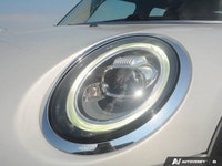 Navigate city streets with playful confidence and undeniable style in this 2021 MINI 5 Door Cooper H... (image 9)