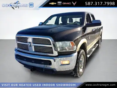 Gorgeous in our used Rugged Brown Pearl, this 2011 RAM 3500 Laramie Crew Cab 4X4 is a tough truck th...