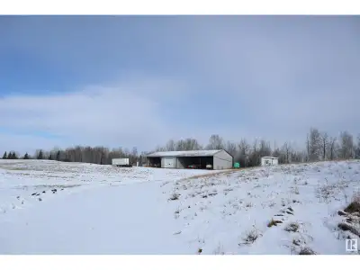 158 Acres Zoned (NSRV) North Saskatchewan River Valley. Fully Developed 30'x46' insulated shop power...