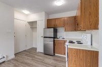 Amenities: Storage Room • Security Lights • Affordable Parking Suite & Building: Bachelor suites Spa... (image 8)