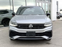 * R-Line exterior design with black styling elements, Black window surrounds, and Black exterior mir... (image 1)