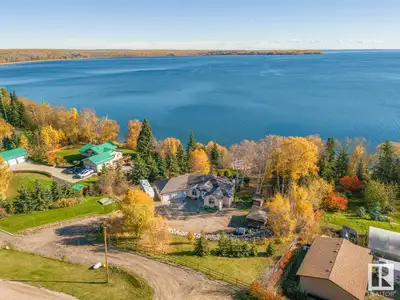 Lakefront Paradise! This incredible property is a rare find, just 100 feet from the water! This bung...