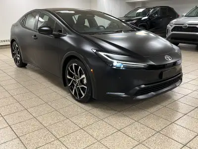 Rush-hour traffic slows to a crawl, but the cabin around you feels more like a modern tech lounge th...