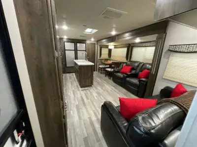 Dutchmen Aerolite travel trailer 3153ML highlights: Theater Seating Two Refrigerators Kitchen Island...