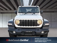 The 2024 Jeep Wrangler Sport in brilliant Bright White, with a mere 33,121 kilometers, is your ticke... (image 1)