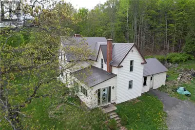 Charming Farmhouse on 70+ Acres with River Frontage Stanley, NB Welcome to 51 Irishtown Road. Farmho...