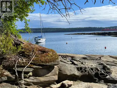 Waterfront! RARE low-bank, 0.36 ac, gently sloping waterfront lot. Located in a peaceful, sheltered...