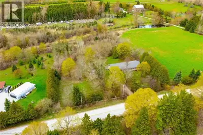 Welcome to this charming bungalow set on a picturesque and private 2-acre rural property just minute...
