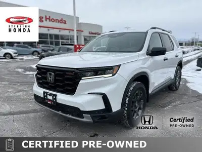 Platinum White Pearl 2023 Honda Pilot TrailSport, with just 52,295 kilometers, redefines family adve...