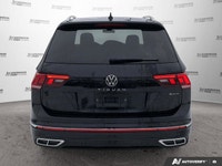 This Volkswagen Tiguan boasts a Intercooled Turbo Regular Unleaded I-4 2.0 L/121 engine powering thi... (image 4)