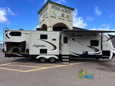 --3 Slide Outs --50 AMP Power Connection --Fireplace --2 TVs --Outside Kitchen with Large Fridge and...