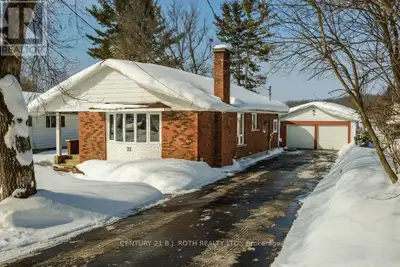 Welcome to this beautifully updated brick bungalow in the heart of Coldwater - where small-town char...