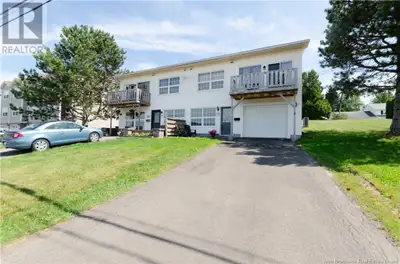 Welcome to carefree condo living with beautiful views of the Petitcodiac River! This charming 2-leve...