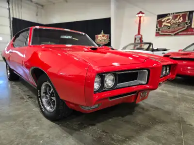 1968 Pontiac GTO in red. Factory color was blue, but you’d never know it by the excellent paint work...
