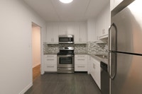 Semi-renovated Akelius three bedroom apartment for rent. Located near Roslyn in the Westmount neighb... (image 2)