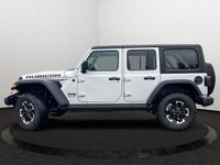 This Jeep Wrangler has a dependable ERC 3.6L Pentastar(TM) VVT V6 engine w/ESS engine powering this... (image 1)