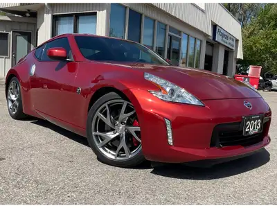 Vehicle Highlights: - Low mileage - Well serviced - Rare find Here's a beautiful Nissan 370Z Touring...