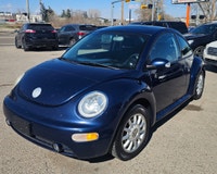 Turn heads and rediscover the joy of driving with this classic 2005 Volkswagen Beetle in a stunning... (image 1)