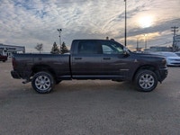 The 2026 Ram 3500 Laramie Crew Cab in Granite Crystal Metallic combines heavy-duty capability with p... (image 7)