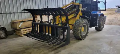 94” Skid Steer Root Rake Grapple – Heavy-Duty Construction – $2,900 This 94-inch Skid Steer Root Rak...