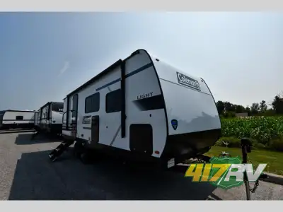 Keystone Coleman Light travel trailer 22BX highlights: Double-Size Bunks Outdoor Refrigerator Air Fr...